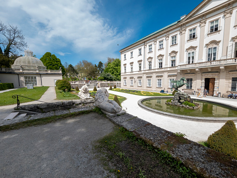 Mirabell gardens in Salzburg, Austria, Europe.  This is The fountain and formal gardens in front of the main building.  This image is from May 2022.