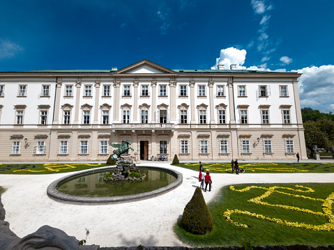 Mirabell gardens in Salzburg, Austria, Europe.  This is The fountain and formal gardens in front of the main building.  This image is from May 2022.