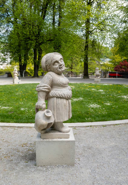 Dwarf Garden (Zwergerlgarten) - position 12 Dwarf with pot - 17th century statue - Salzburg, Austria.