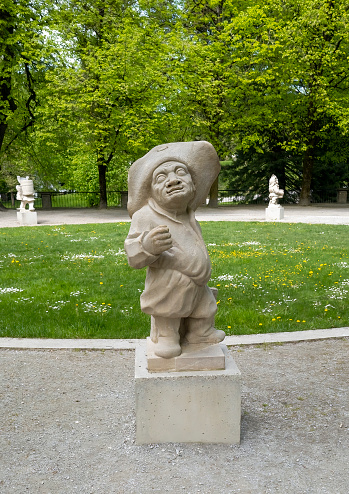 Dwarf Garden (Zwergerlgarten) - position 4 Dwarf with radish bag - 17th century statue - Salzburg, Austria.