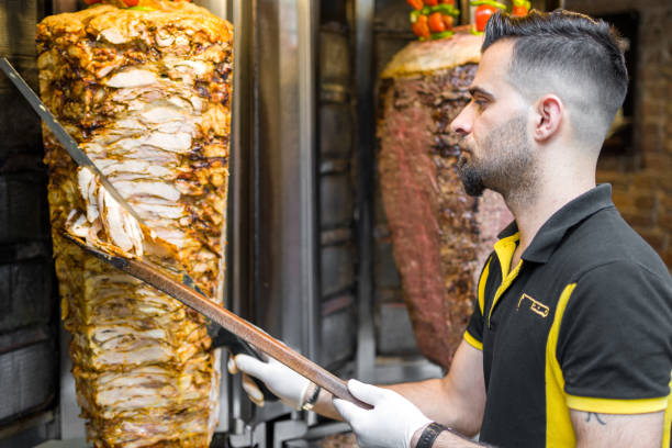 istock Chicken doner kebab preparation cutting 1405233646