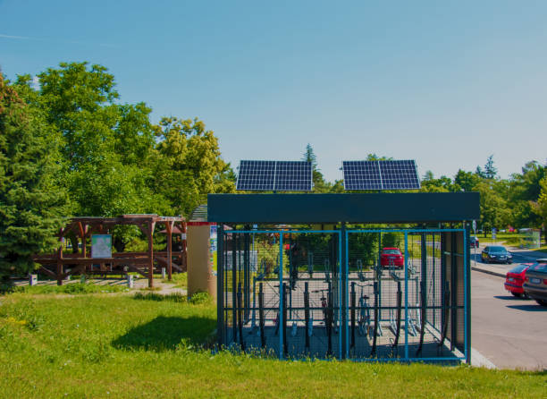 Solar panels in the bike park. Alternative energy source. Energy crisis. stock photo
