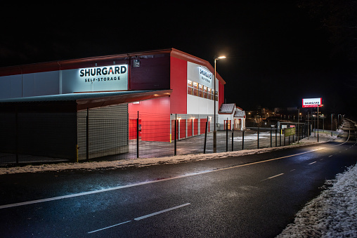 Gothenburg, Sweden - november 28 2021: Night photo of the exterior of a Shurguard self storage facility