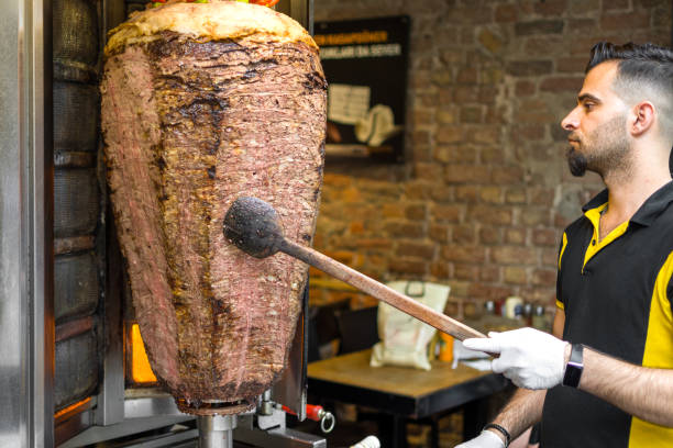 istock Doner kebab preparation cutting 1405239527