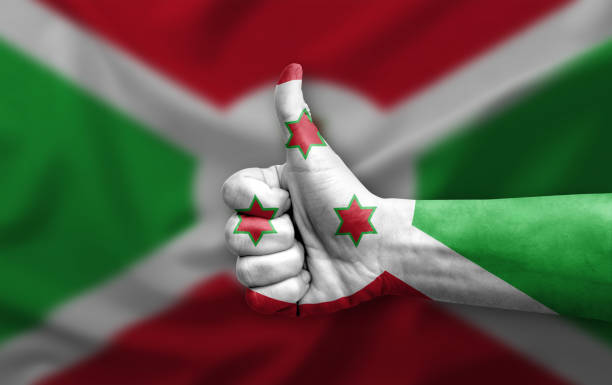 Hand making thumb up painted with flag of burundi