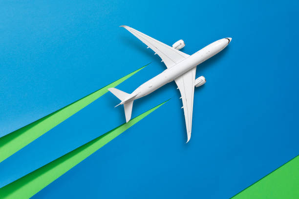 Passenger aircraft on blue background stock photo