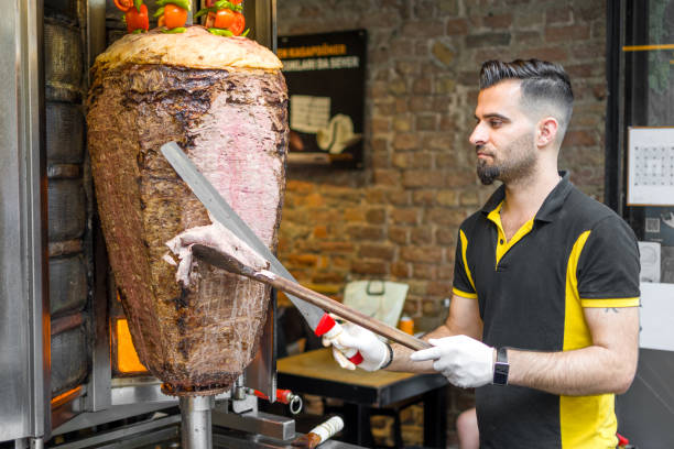 istock Doner kebab preparation cutting 1405241940