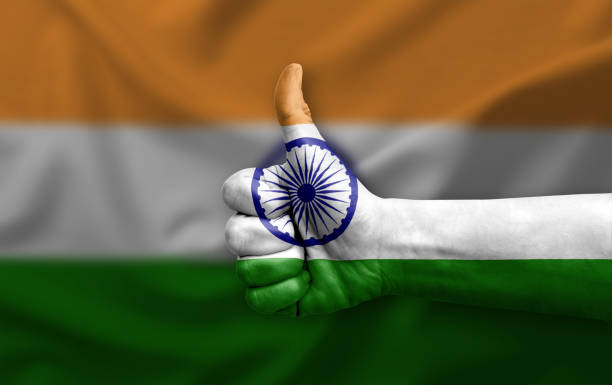 istock Hand making thumb up painted with flag of india 1405242325
