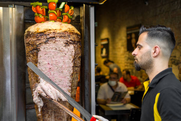 istock Doner kebab preparation cutting 1405245026