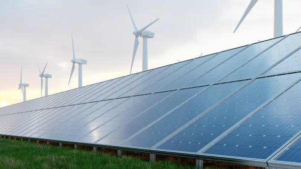 istock Solar panels and wind turbine on the sky background. 1405246127