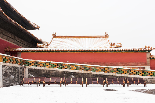 The eaves of the Forbidden City Palace in Beijing in the snow