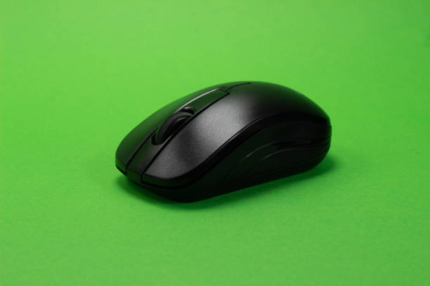 istock Wireless black mouse on a green isolated chroma key background 1405248249