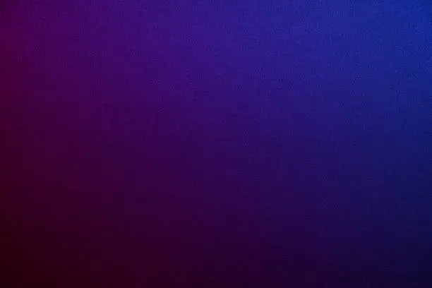 Photo of Deep purple blue abstract background. Gradient. Toned fabric surface texture. Dark colorful background with space for design.
