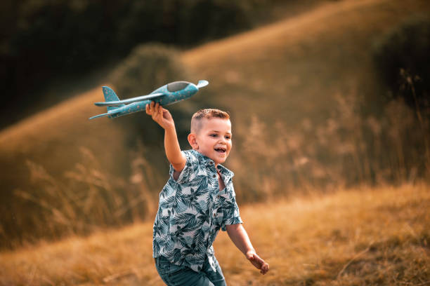 istock brother and sister play in nature 1405249890