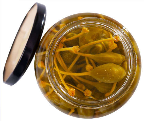 istock Glass jar with pickled green capers 1405253034