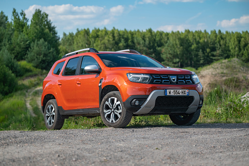 Zdiar, Slovakia - 25 June, 2022: Second generation of Dacia Duster (after facelift) stopped on a road. This low-cost car is one of the most popular SUV vehicles in Europe.