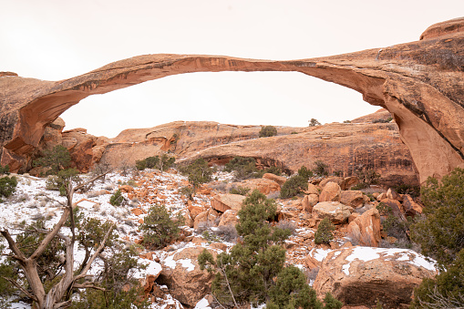 Time with the help of the sun, rain and wind, has shaped this boulder making it unique. Arches National Park is a national park in eastern Utah in the United States. The park is adjacent to the Colorado River 4 miles (6 km) north of Moab, Utah.