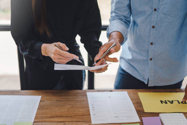 istock Business people meeting working with talk, consult, discuss working with new startup project idea presentation analyze plan marketing and investment in the office. 1405256399