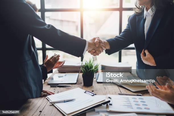 Business People Shaking Hands To Congratulate Success Business Executives Handshake To Congratulate The Joint Business Agreement Stock Photo - Download Image Now
