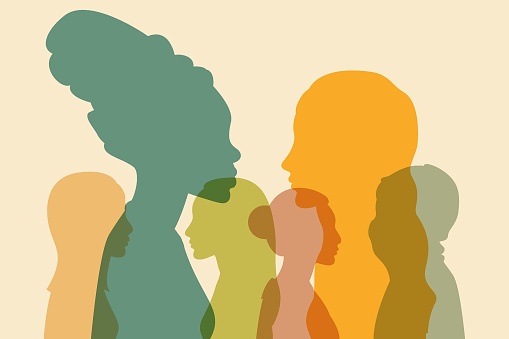 Silhouettes of women from different cultures. Multicultural society. The concept of racial equality and anti-racism. Communication and friendship of women of different nationalities.