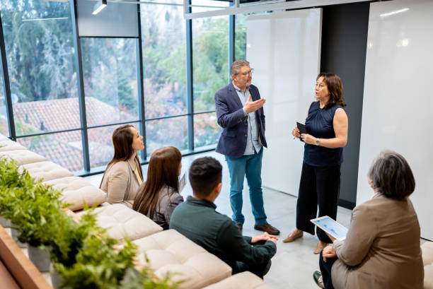 istock Businesspeople doing a presentation in the conference room 1405261653