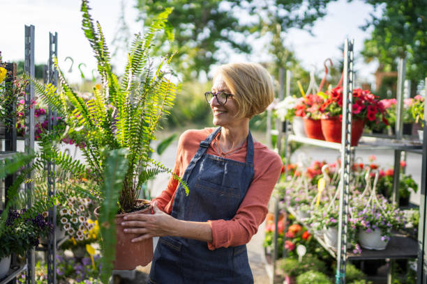 istock Woman loves plants 1405264442