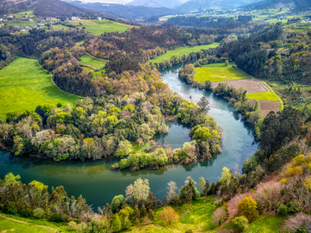 Aerial view of the meanders of the Navia river. stock photo