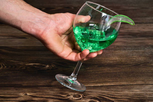istock Cup with refreshing green liquid and a slice of aloe vera 1405265613