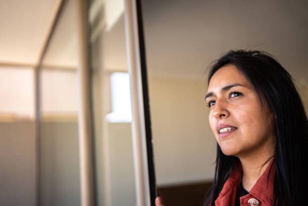 istock Woman contemplating at home 1405266700