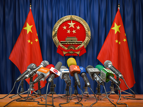 Official press conference of China fgoverment or president. Flags of China and microphones. 3d illustration
