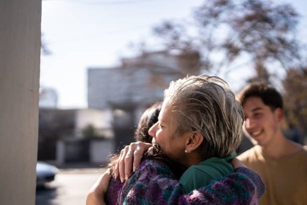 istock Mother welcoming daughter 1405267394