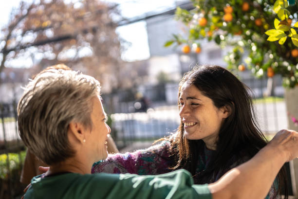 istock Mother welcoming daughter at home 1405267455
