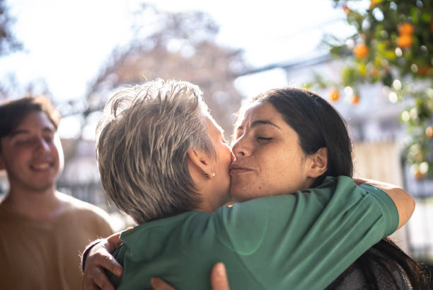 istock Mother welcoming daughter at home 1405267459