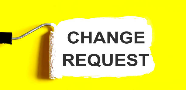 istock CHANGE REQUEST One open can of paint with white brush on it on yellow background. Top view. 1405268327