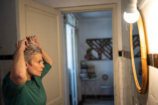 istock Mature woman getting ready at home 1405269406