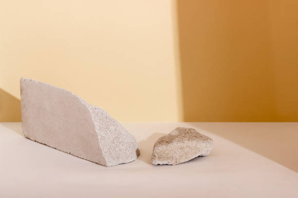 istock Background with geometric shapes made of concrete for cosmetic products. Rectangular podiums with shadows on a beige background. Blank mockup for product packaging presentation 1405270985