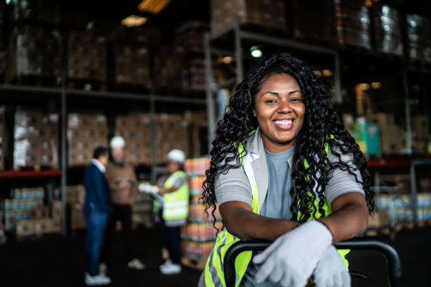 Portrait of a warehouse worker Portrait of a warehouse worker physical work stock pictures, royalty-free photos & images