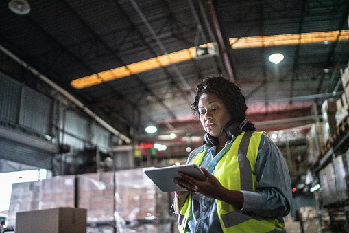 Warehouse worker taking inventory