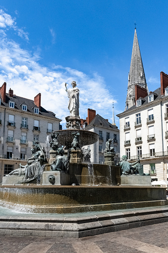 Nantes, beautiful city in France, fountain place Royale, in the historic center, with typical buildings in background