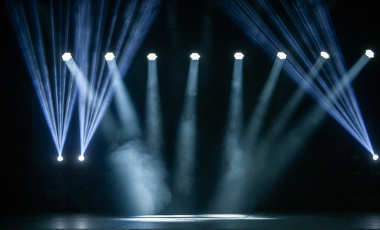 The concert on stage background with flood lights