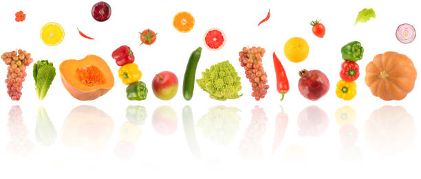 istock Falling fresh vegetables and fruits with light reflection isolated on white 1405279555