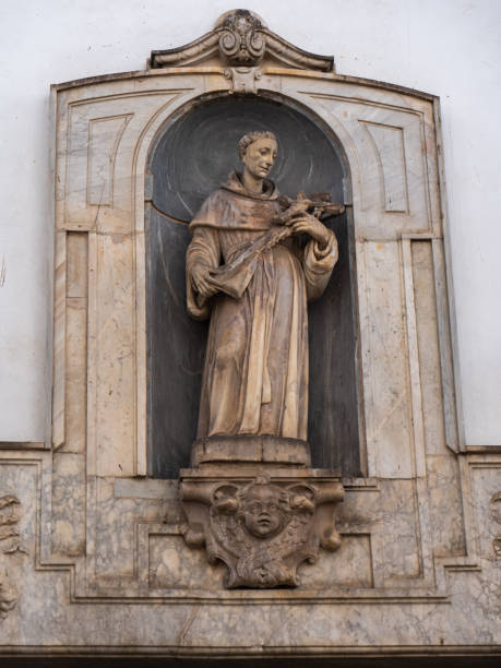 istock Christian statue worked into a house wall 1405280566