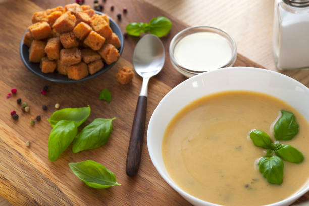 Mushroom cream soup with croutons - close up view