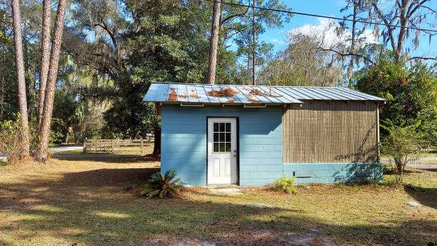 istock Shack Building Work House Boue with Trees In the Background 1405285001