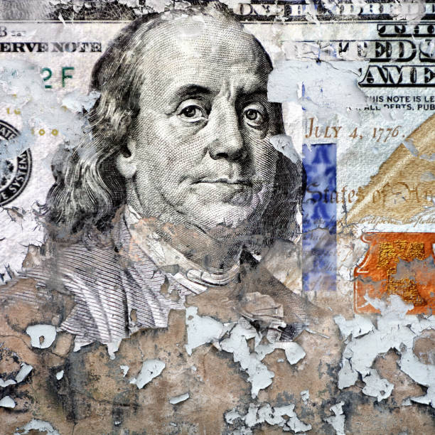 Financial difficulties concept of peeled American one hundred dollar Conceptual finance image of close up torn American one hundred dollar bill money shortage stock pictures, royalty-free photos & images