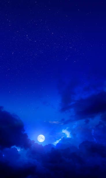 istock Full moon and stars in blue dramatic night sky 1405292395