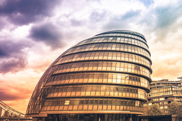 Skyscrapers in the City of London from the ground looking up Skyscrapers in the City of London from the ground looking up gla building stock pictures, royalty-free photos & images