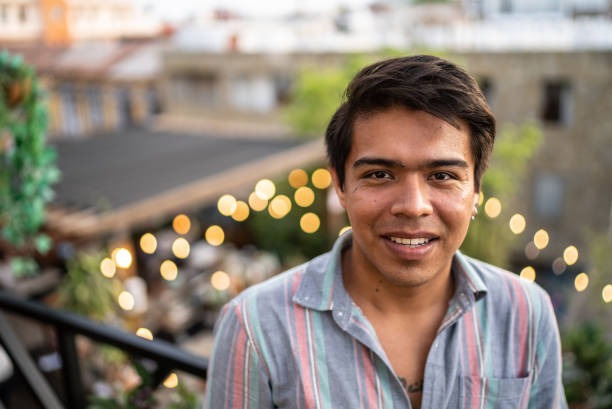 istock Portrait of a happy man at rooftop 1405297868