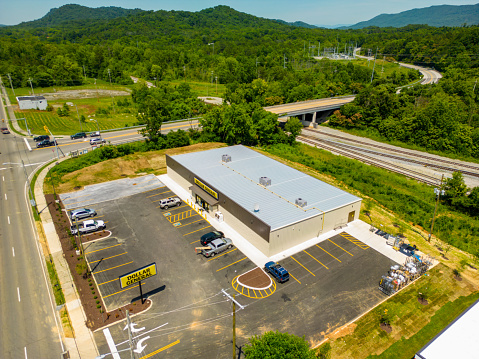 Etowah, TN, USA - June 21, 2022:  Aerial drone photo of a Dollar General store in Etowah Tennessee
