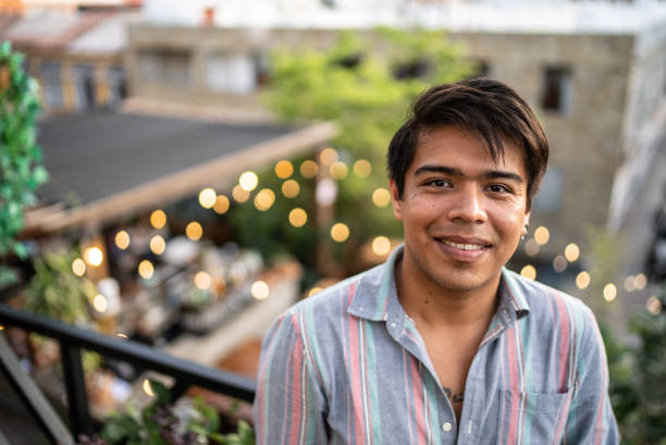 istock Portrait of a happy man at rooftop 1405297882